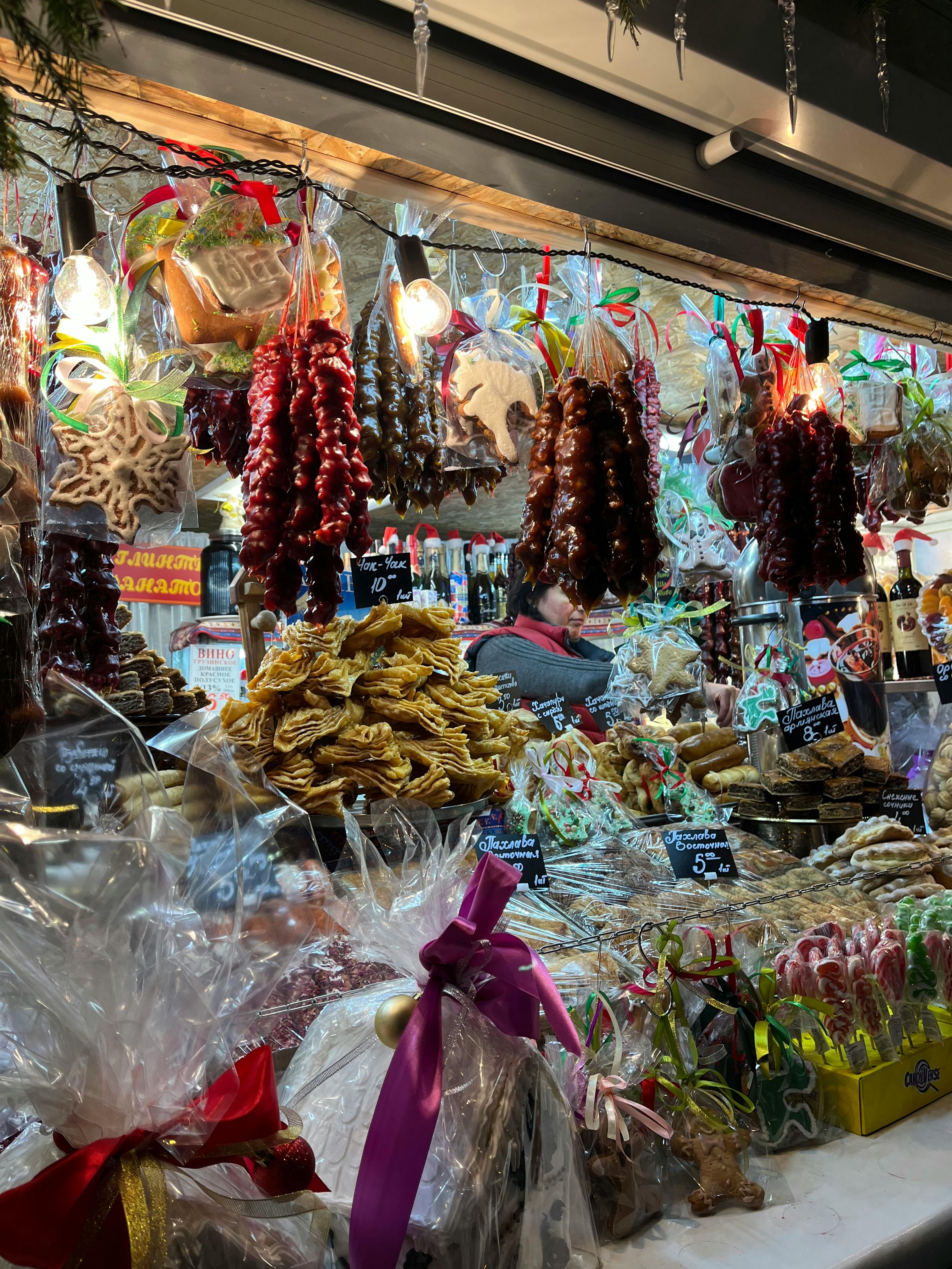 a market stall with food at a christmas market