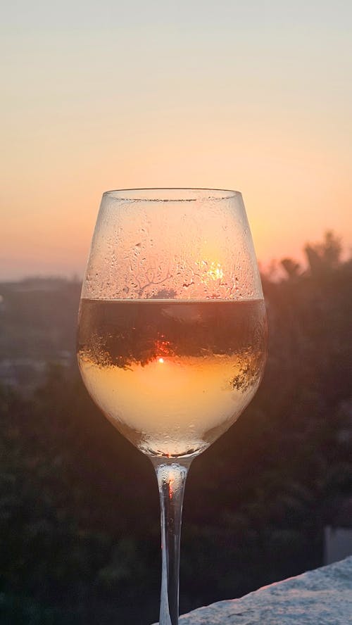 Бесплатное стоковое фото с бокал вина, вино, закат