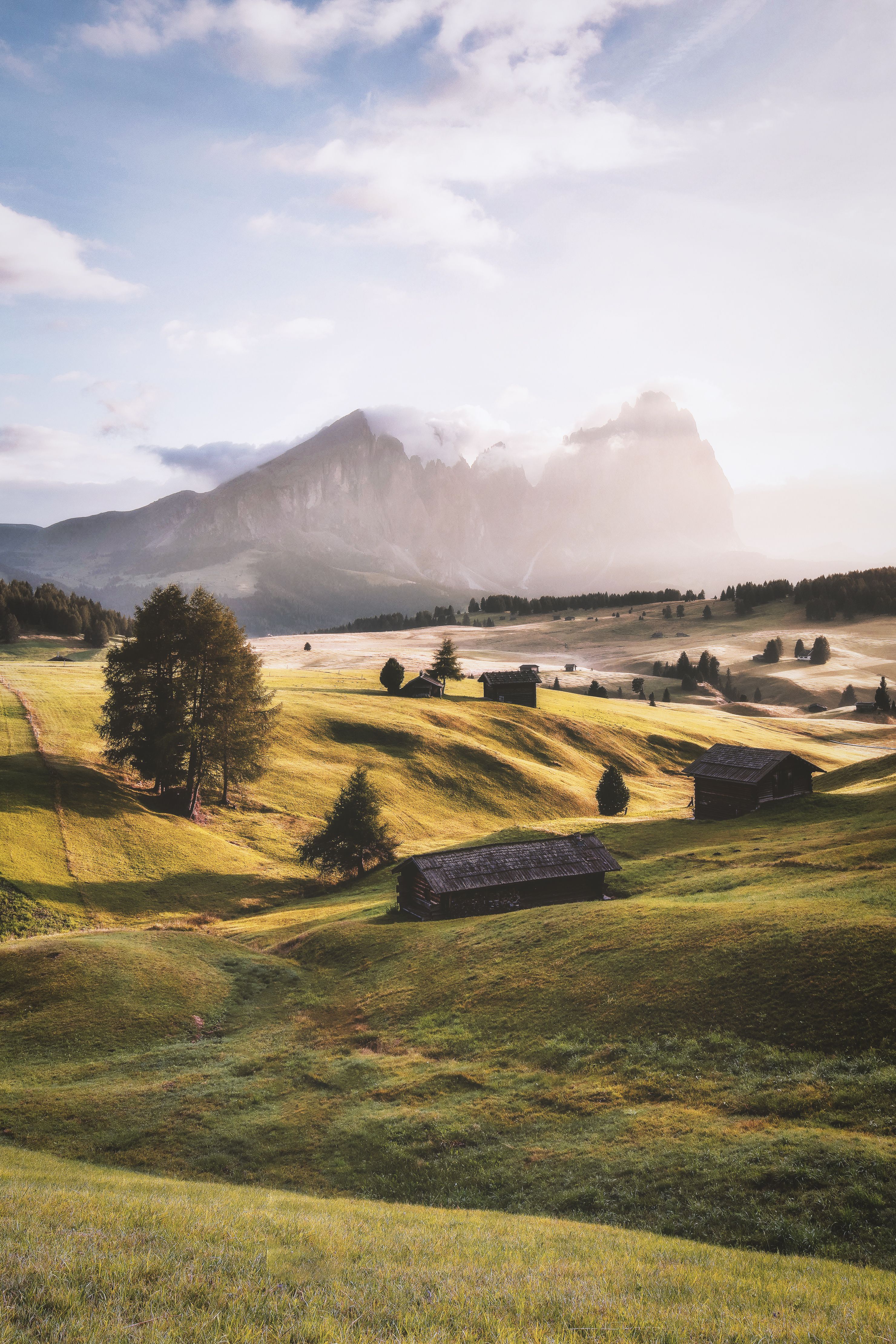 Hay huts on the Alpe di Siusi below the Sassolungo