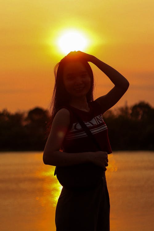 Foto d'estoc gratuïta de llac del capvespre, nena, vietnamita