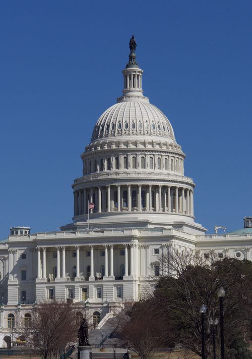 Free The iconic United States Capitol Building showcasing neoclassical architecture on a clear day in Washington DC. Stock Photo