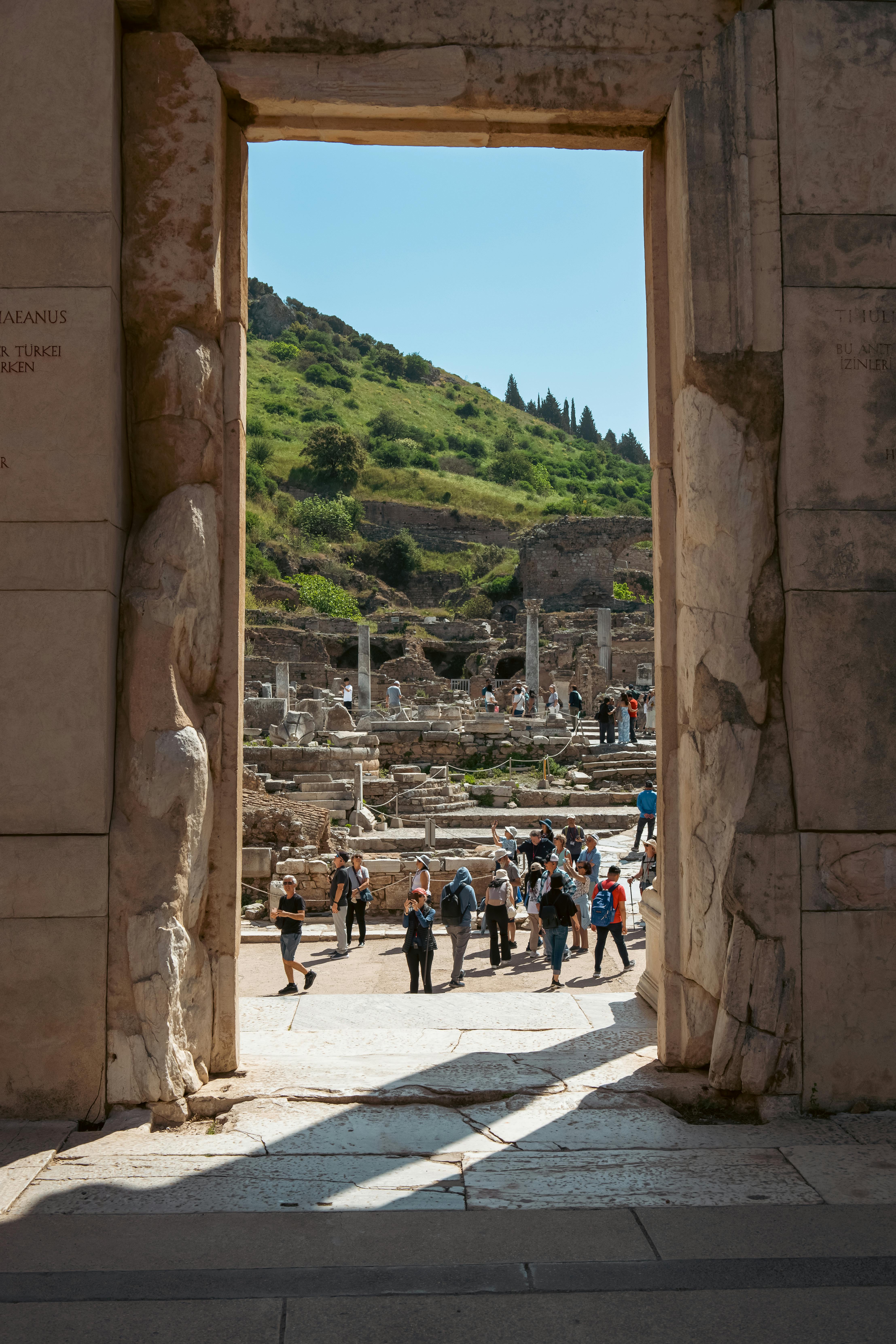 tourists visiting ephesus ruins