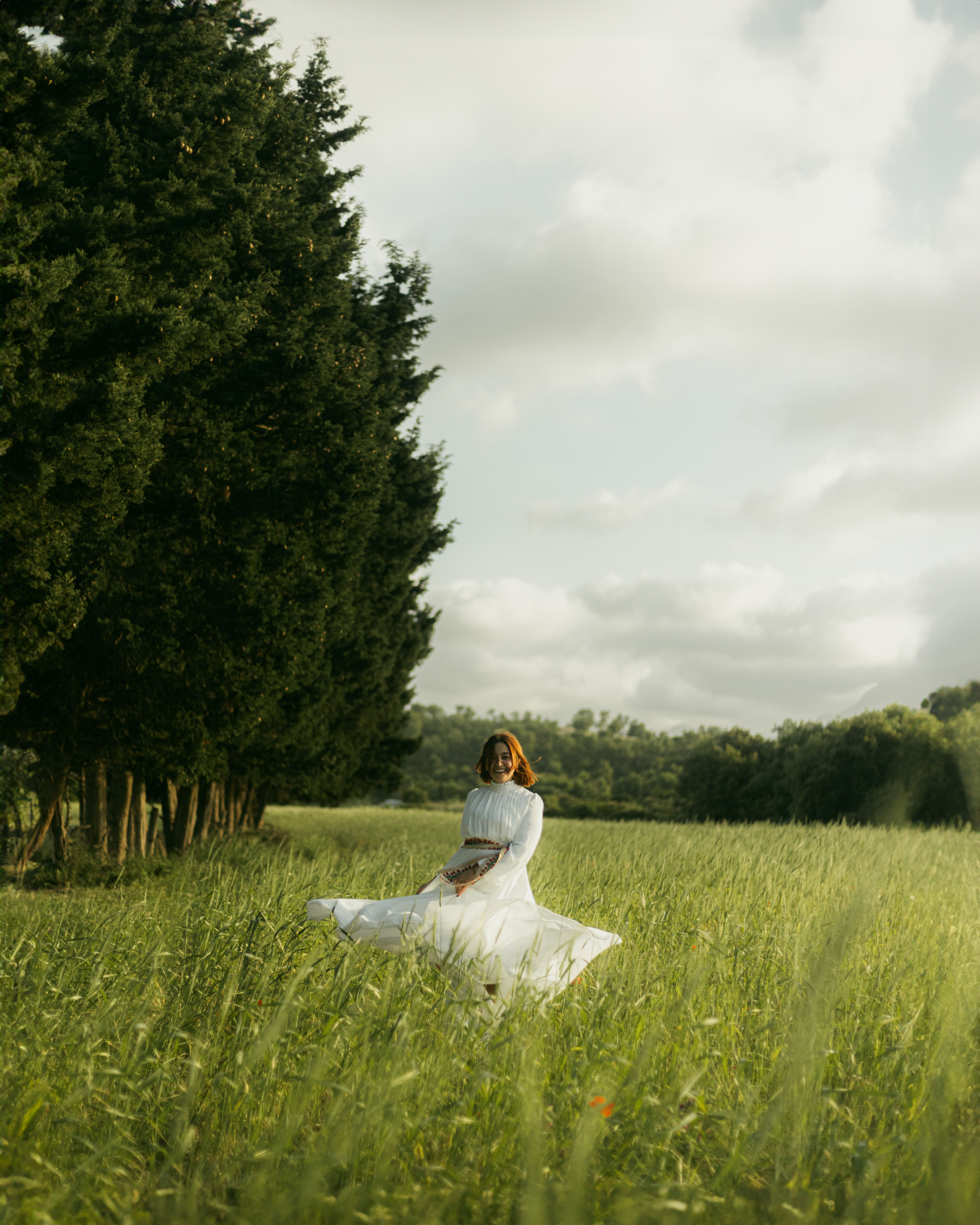 Woman in White Dress Standing on Meadow · Free Stock Photo