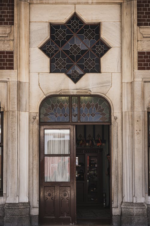 The entrance to a building with a large window