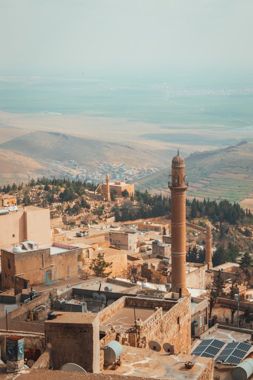 A view of the city of yarmouk from the top of a hill