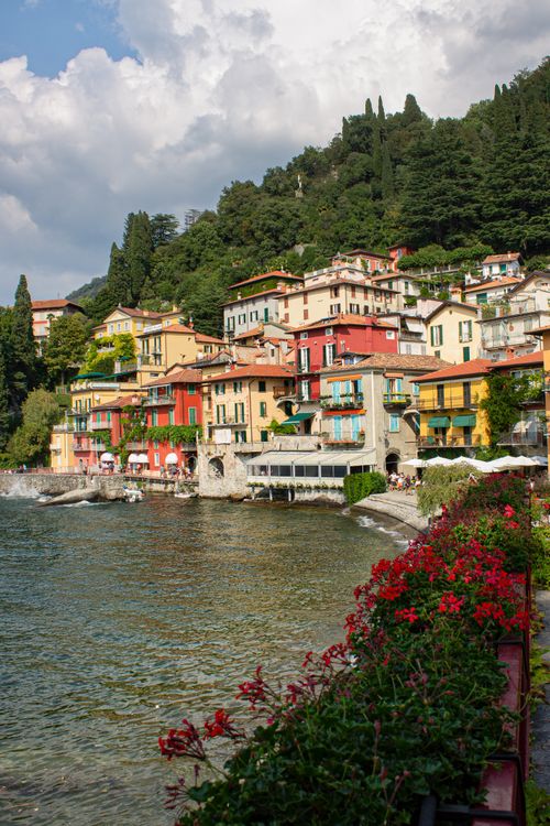 Free Colorful houses along Lake Como in Varenna, Italy under a bright summer sky. Stock Photo