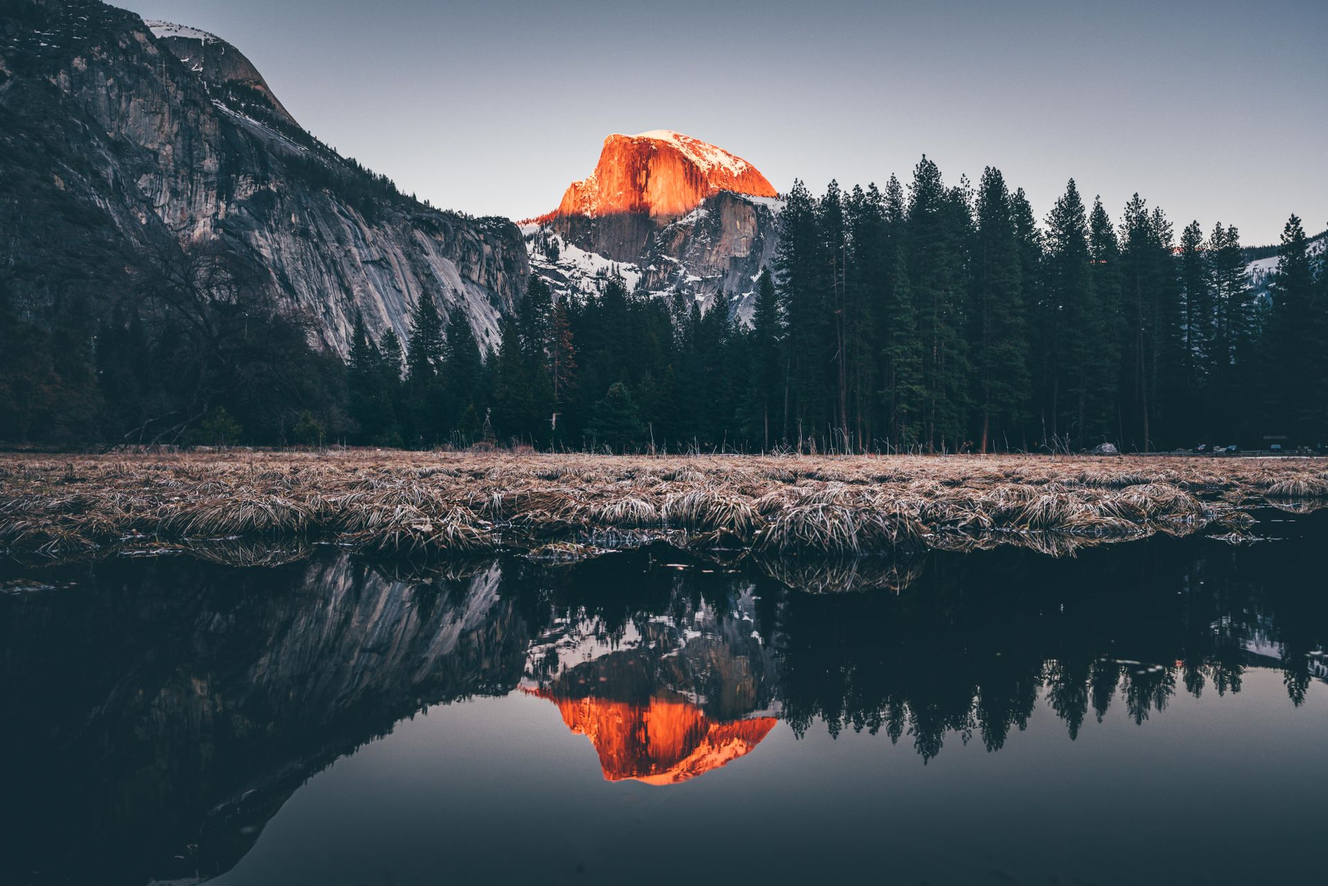 Granite peak reflected in still water at sunset near Bozeman