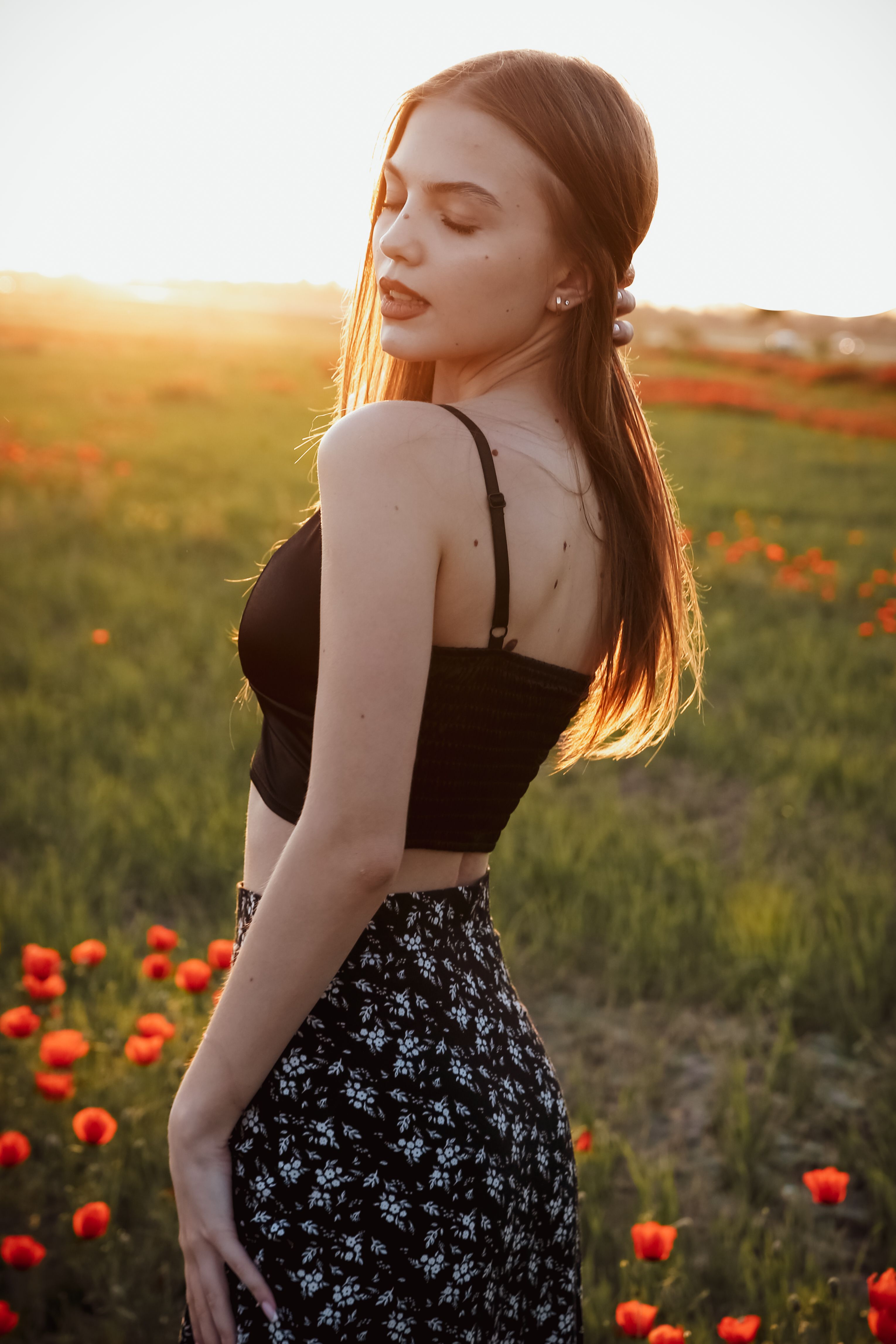 Portrait of Woman Standing with Eyes Closed on Meadow · Free Stock Photo