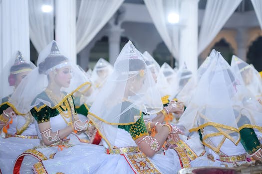Women in traditional Manipuri attire perform a classical dance in Imphal, India.