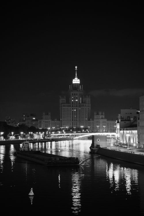 Free Black and white night scene of Radisson Collection Hotel in Moscow overlooking the river. Stock Photo