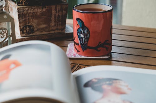 Mug With Coffee On Table