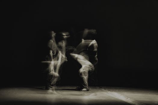 Blurred Dancers in Black and White