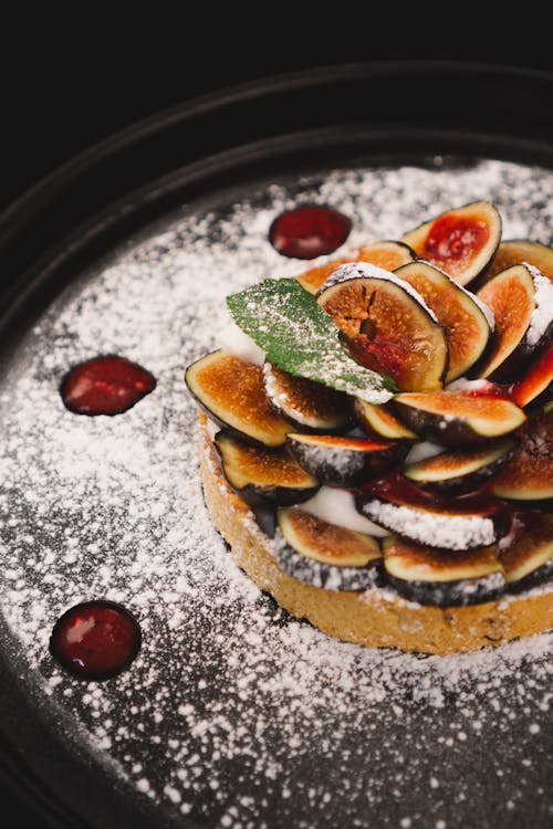 Dessert with Fruits and Powdered Sugar