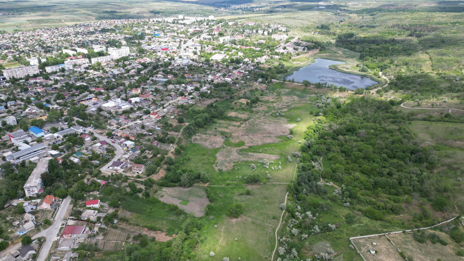 Aerial cityscape of Cahul, Moldova showcasing urban and natural landscapes.