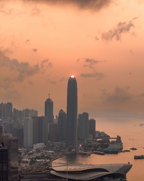 A sunset over hong kong city skyline