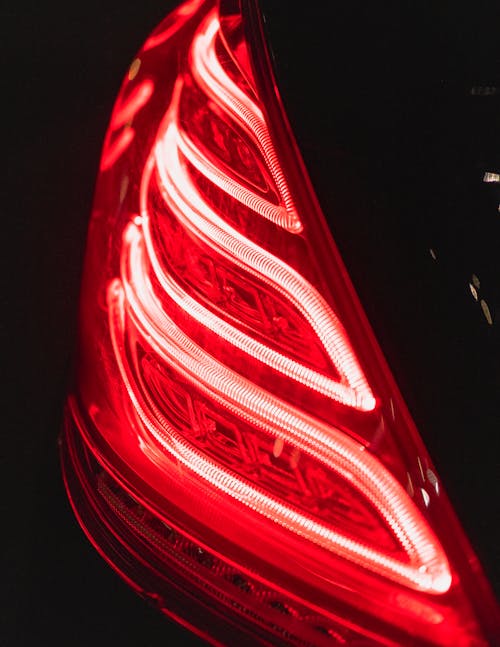 The rear lights of a car are red