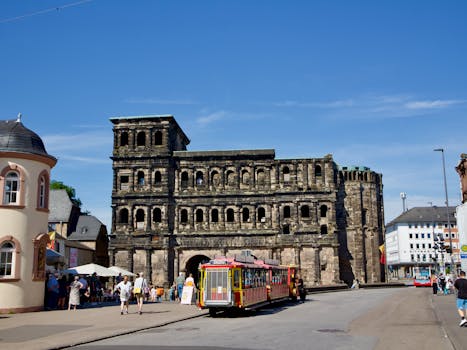Explore Porta Nigra, the ancient Roman gate in Trier. A historic landmark captured beautifully on a sunny day.