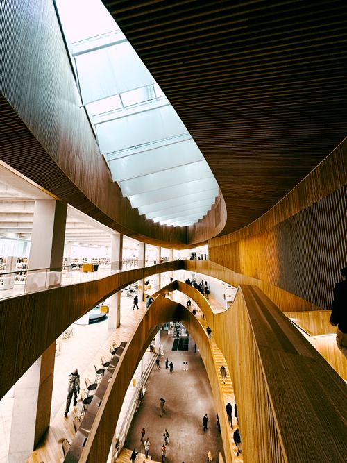 Free Modern architectural marvel showcasing the wooden atrium of Calgary Central Library. Stock Photo