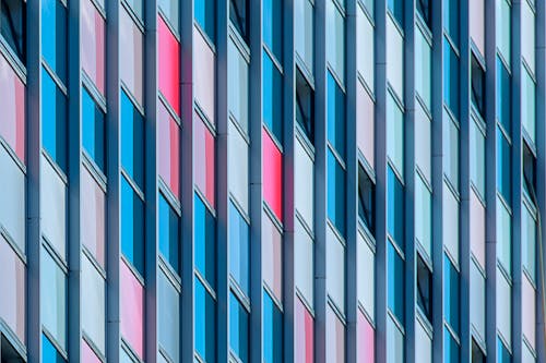 A close up of a building with colorful windows