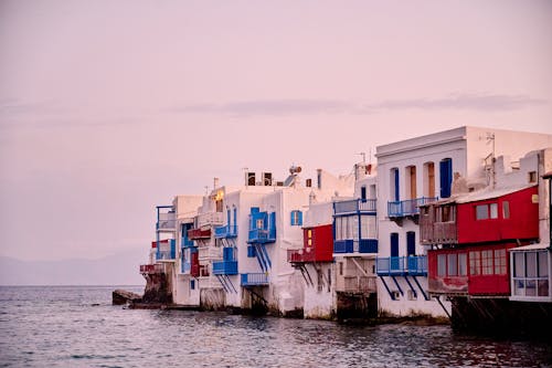 A row of colorful houses on the water