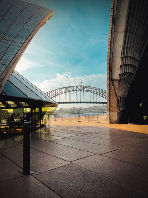 Free Beautiful view of Sydney Harbour Bridge from the Sydney Opera House exterior. Stock Photo