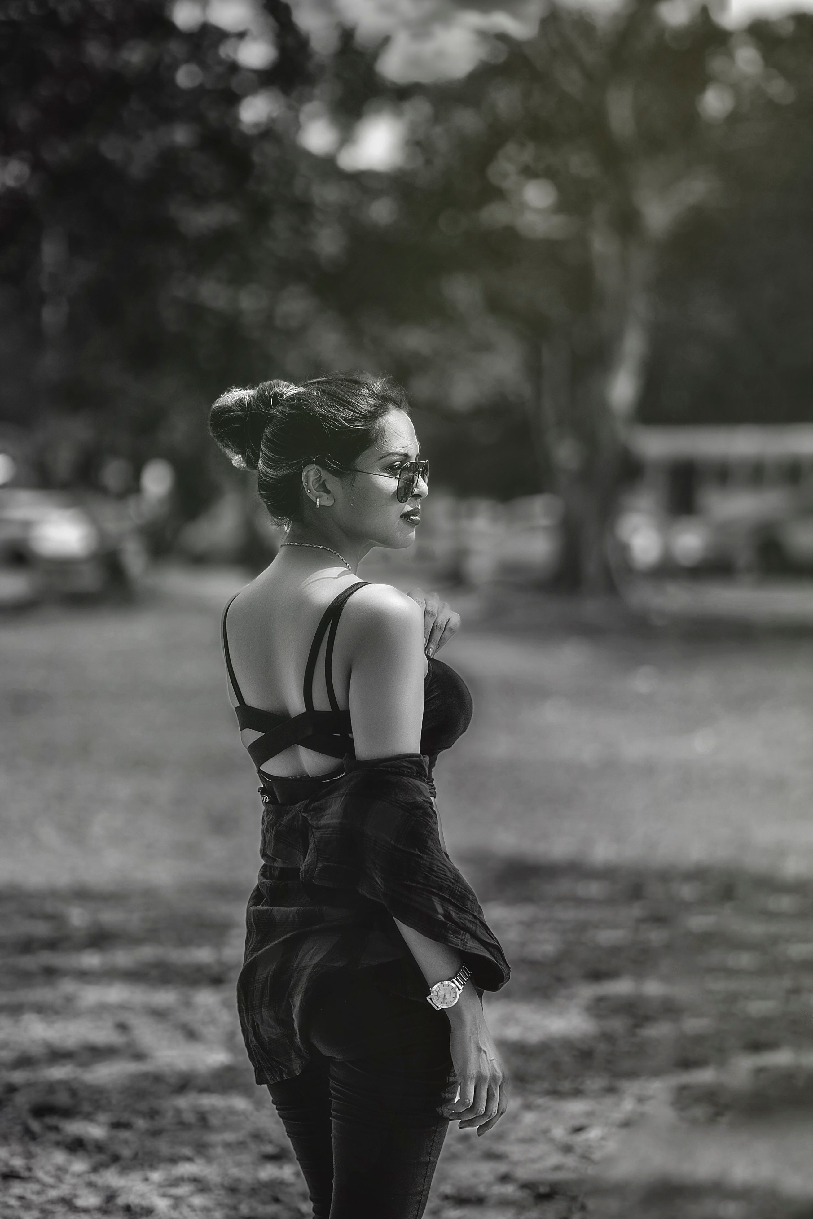 A Woman Standing in a Park · Free Stock Photo