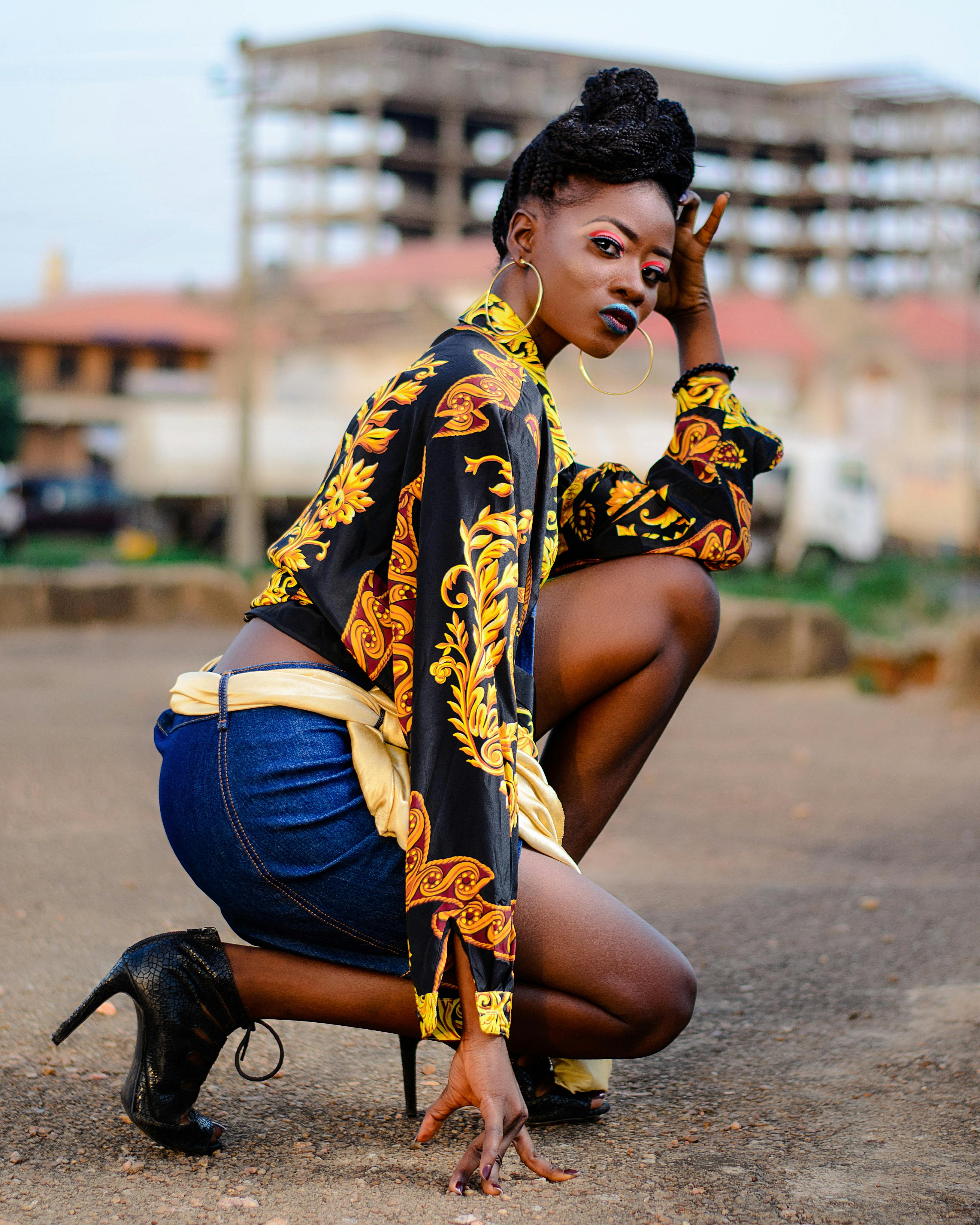 woman wearing black and yellow floral blouse