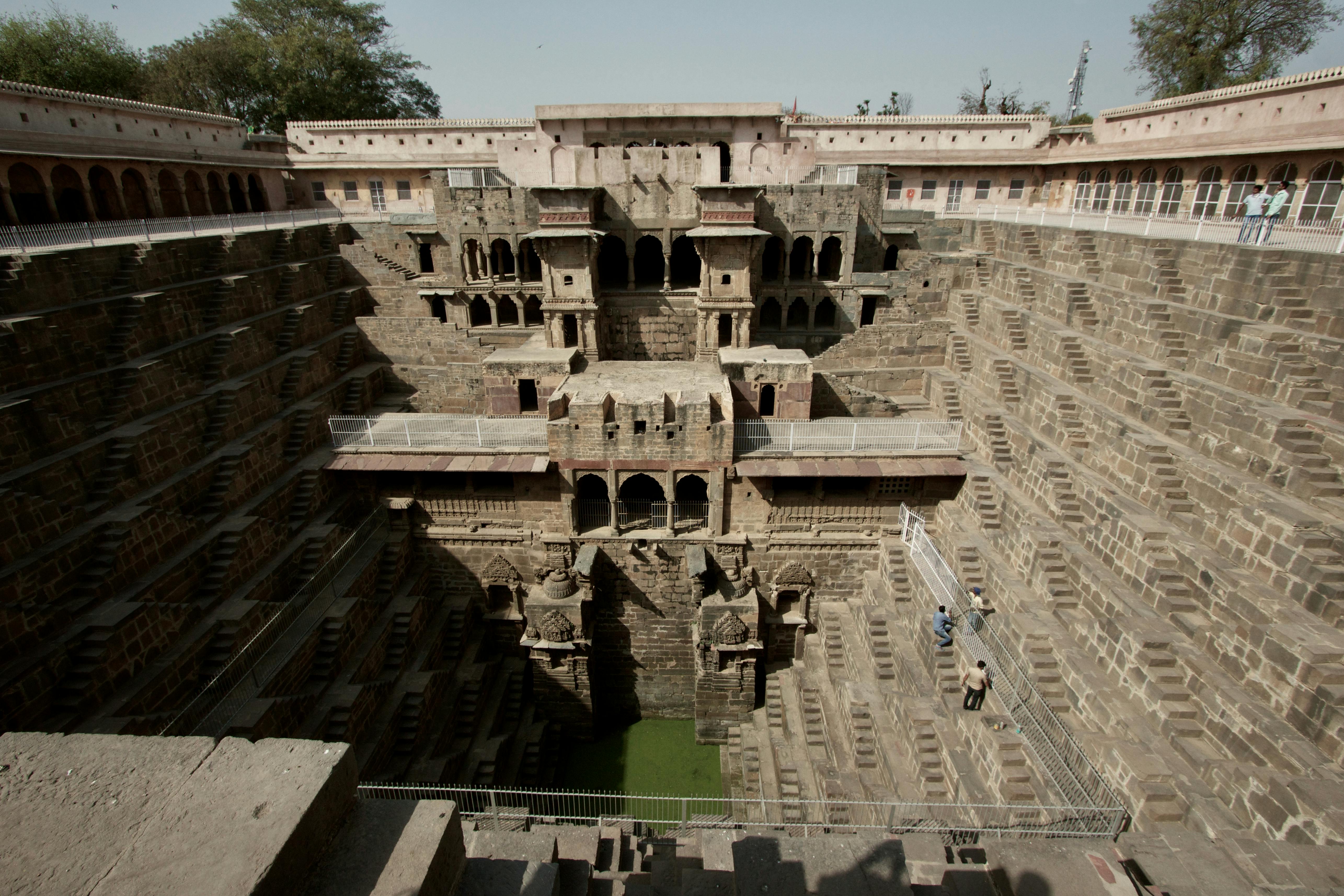 Explore the ancient architecture of Chand Baori, a historic stepwell in Rajasthan, India. - Chand Baori