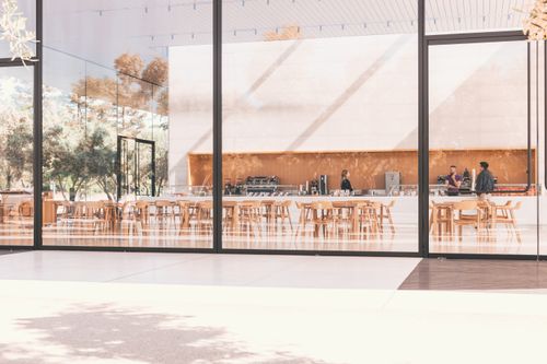 Free Contemporary café with glass panels and natural light in Cupertino. Stock Photo