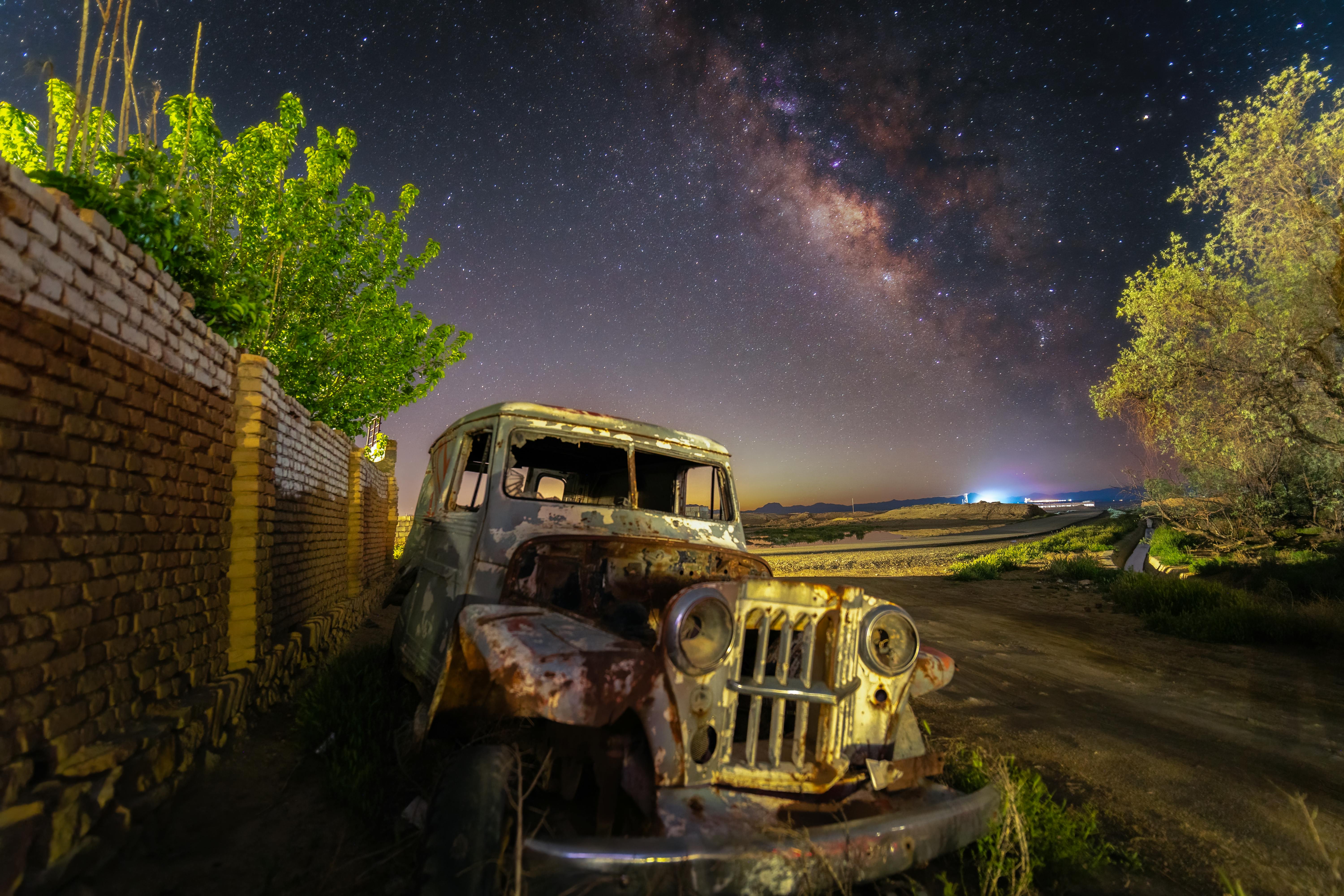 milky way over abandon car