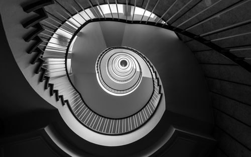 Free Black and white image of a spiral staircase with a diminishing perspective in Hamburg. Stock Photo