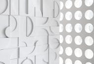 抽象白色墙壁设计，几何形状与圆形图案结合，非常适合当代空间