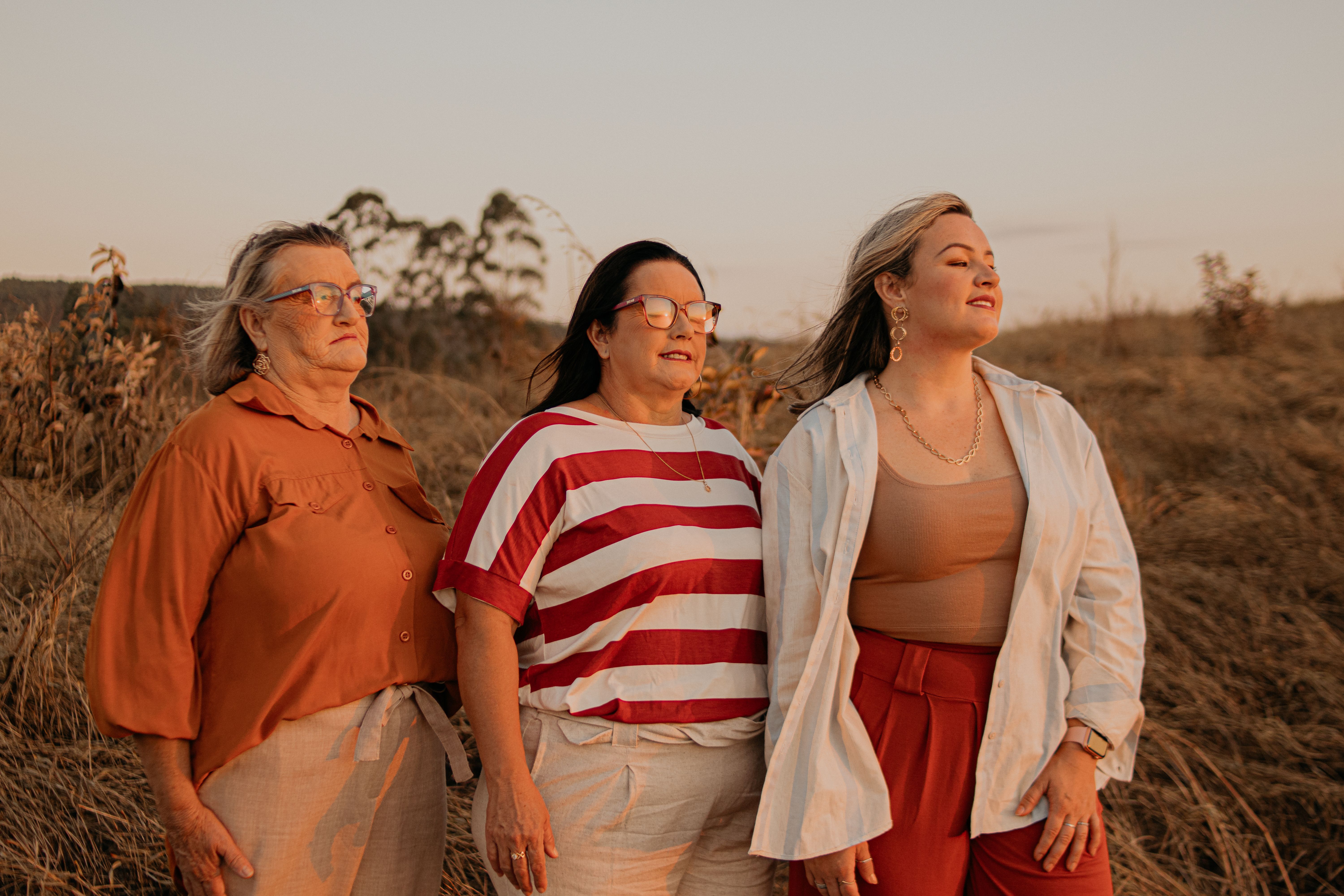 a-group-of-women-standing-on-a-meadow-free-stock-photo