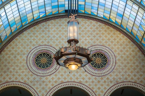 A ceiling with a light fixture and a dome