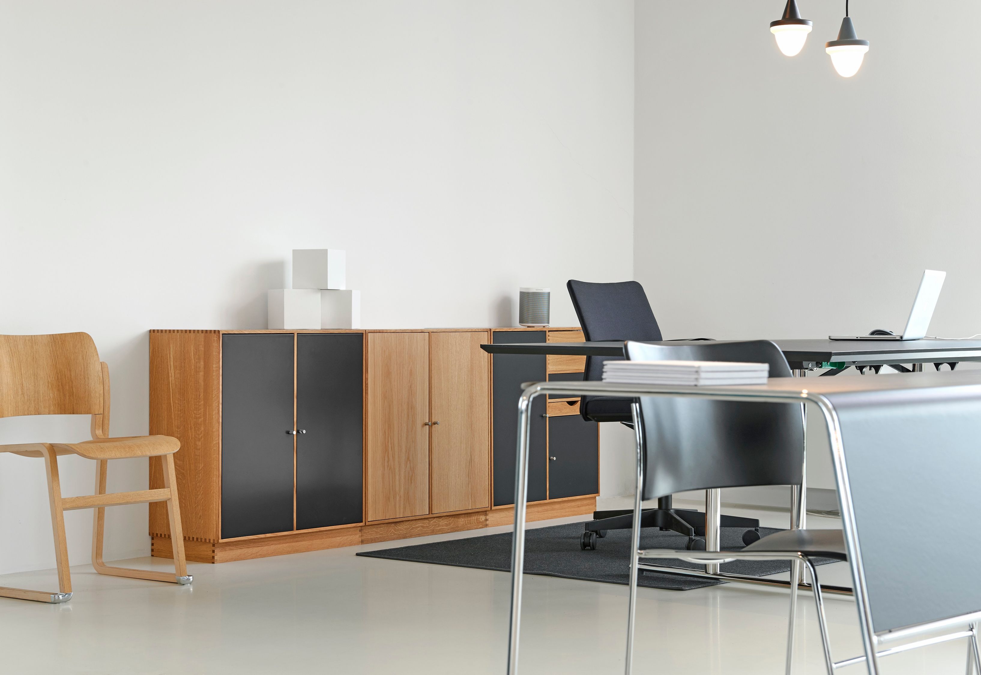 Black Padded Rolling Armchair Beside Desk Free Stock Photo black-padded-rolling-armchair-beside-desk-free-stock-photo