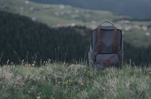 Close-Up Photo of Backpack On Grass