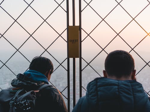 two men looking down