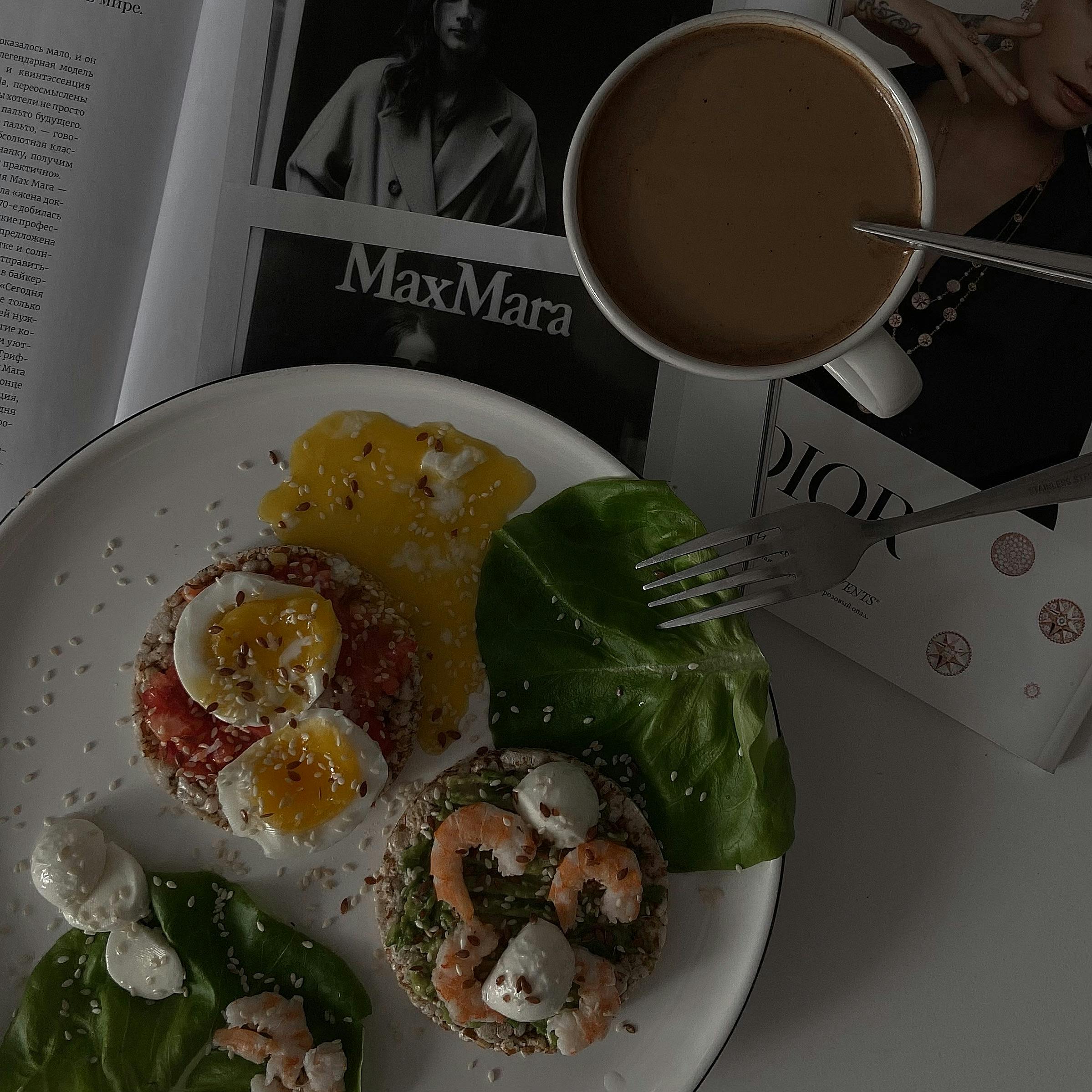 Eggs and Shrimp Served on Bread and Cup of Coffee