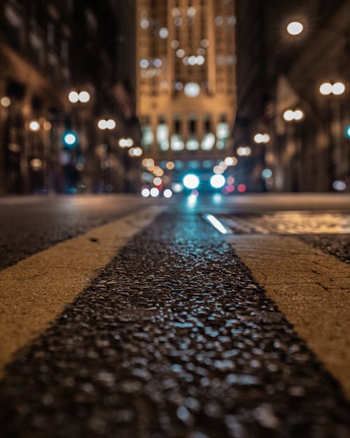 Free Gray and Brown Road during Nighttime Close-up Photography Stock Photo