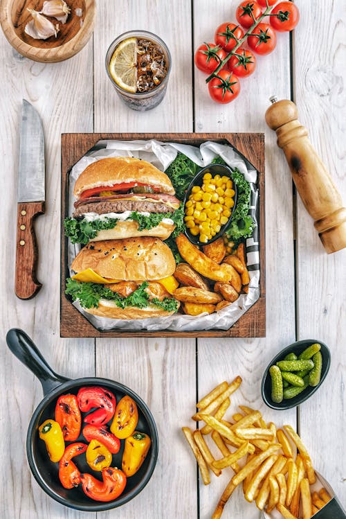 Burgers With Fries and Tomatoes