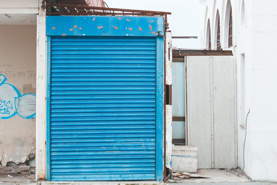 Free Closed Blue Metal Roll-up Door Stock Photo