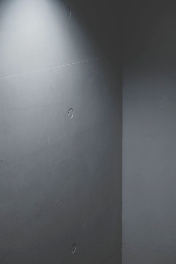Minimalist concrete wall in soft light — H&CO on Pexels