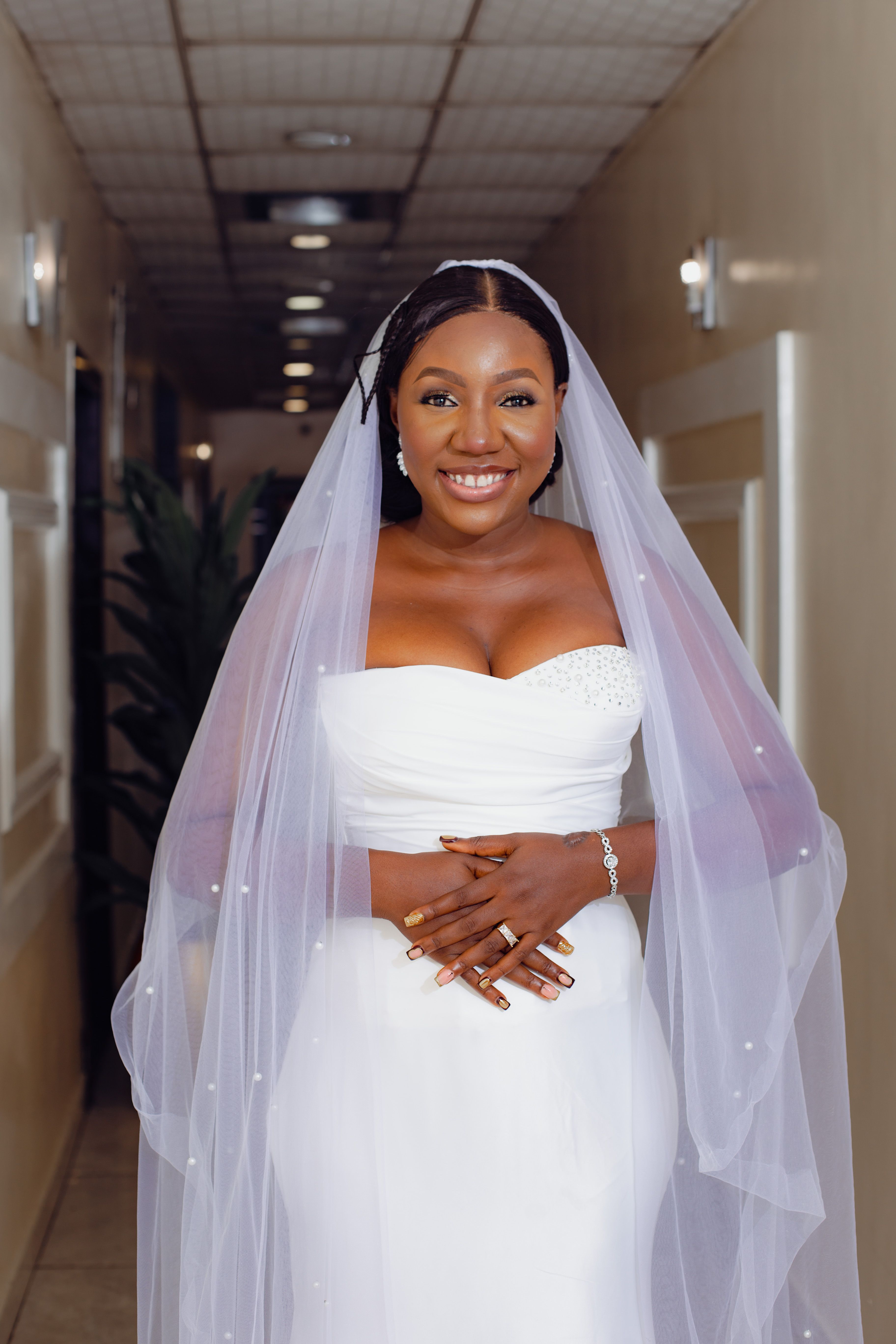 Portrait of a Smiling Bride In a White Wedding Dress and Veil · Free ...