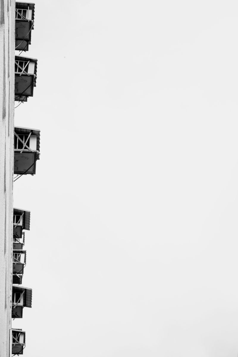 HVAC units mounted on the exterior wall of a building