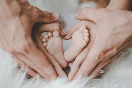 Gratis lagerfoto af baby, barn, familie, fødder