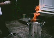 Stainless Steel Trash Can On Fire