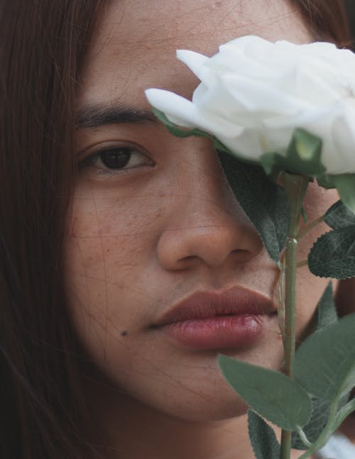 Woman Behind White Rose