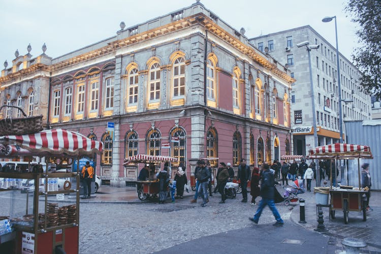 Photo Of People Walking Near Buildings