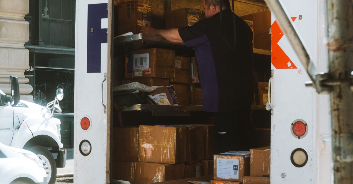 Delivery Rider Loading Image Delivery Driver Loading Truck on Street · Free Stock Photo