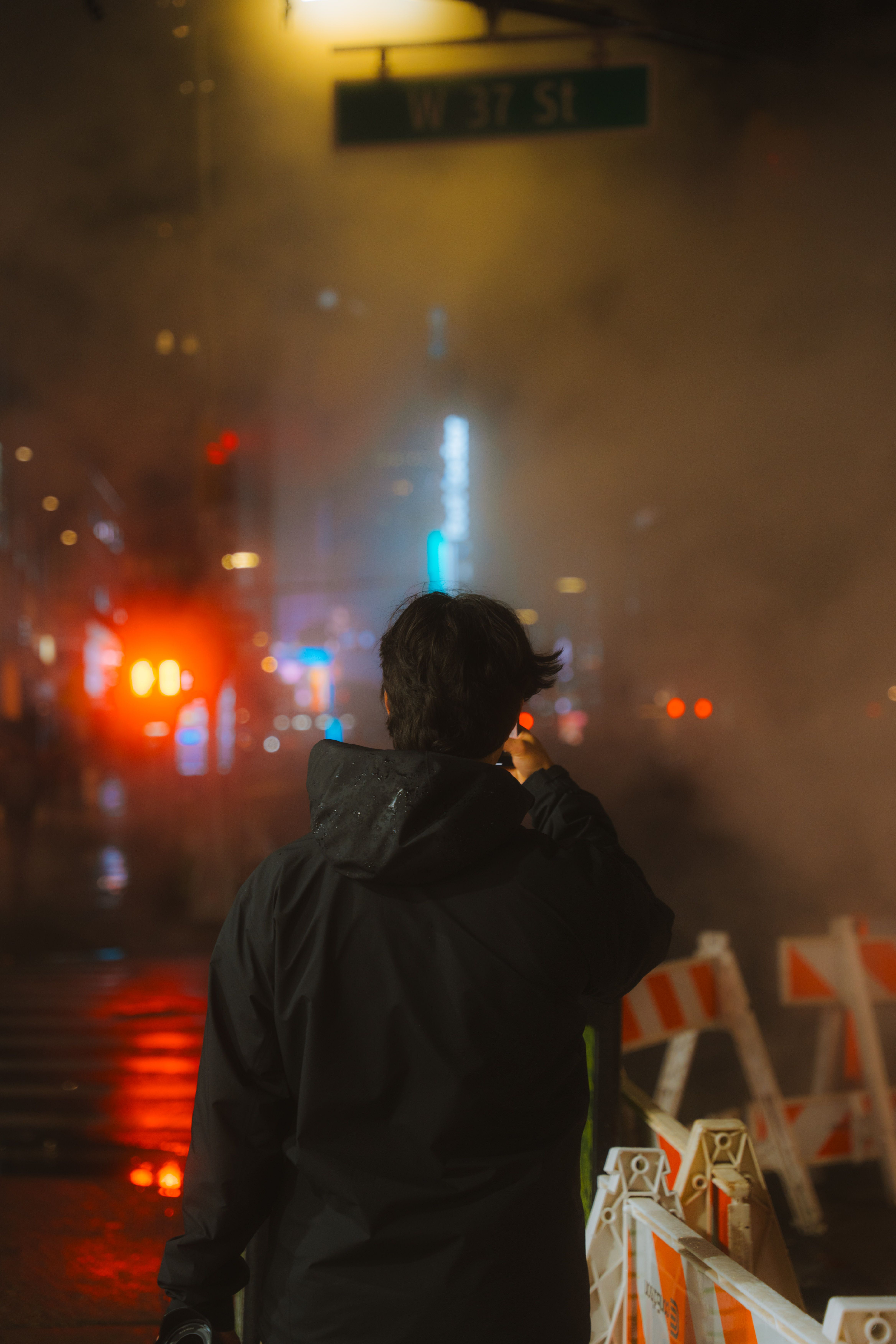 Person Standing on Street at Night · Free Stock Photo